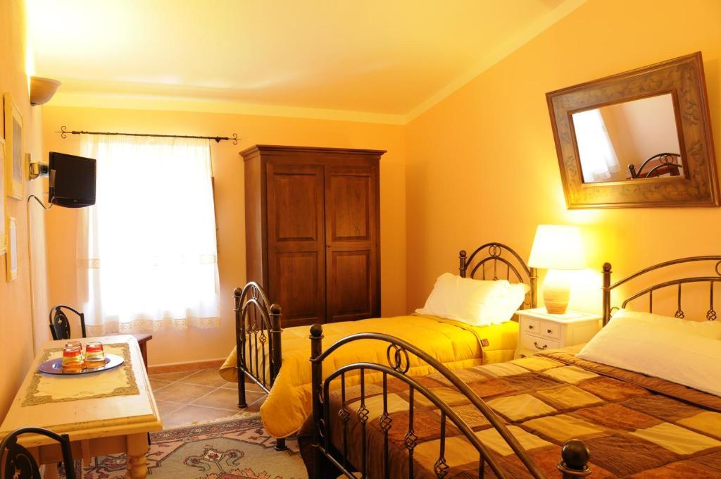 Hotel La Casa Di Babbai Nuchis Camera foto